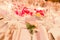 White Name Tag on Flowery Wedding Dinner Table with Silverware