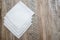 White napkins on a wooden background. copy space.