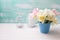 White narcissus and pink tulips in blue bucket on white paint