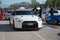 white Nissan GT-R35 at a Japanese sports car meet.