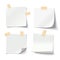 White note papers with curled corner and adhesive tape, ready for your message