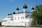 White old church with green domes in Astrakhan Kremlin