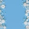 White openwork volumetric snowflakes on a light blue background. Beautiful Christmas 3D greeting card