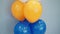 White, orange and blue balloons