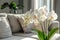 White orchids with light, spacious interior backdrop, serene ambiance.