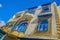 White oriental house with blue windows in Medina, Hammamet Tunisia