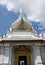 White ornate tower of buddhist temple Wat Phra Kaew, Bangkok
