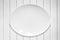 White Oval Plate on White Timber