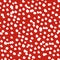 White paint dots on red background