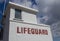 A white painted concrete lifeguard station along the sea front at New Brighton Wirral Merseyside June 2012
