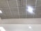 An White painted Emulsion painted for an gypsum ceiling with Macro Grid ceiling for an suspended false ceiling of an Shopping mall