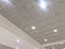 An White painted Emulsion painted for an gypsum ceiling with Macro Grid ceiling for an suspended false ceiling of an Shopping mall