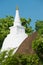 White painted stupa at Isurumuniya rock temple in Anuradhapura, Sri Lanka.