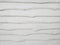 White painted wooden texture background. Rough uneven wooden horizontal boards