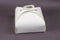 White Paper Cake or Lunch Box on Gray. Closed kraft packaging wi