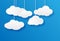 White paper cloud set on blue fading background on strings, vector illustration