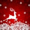 White paper deer on a red background