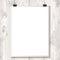 White paper hanging on binder on a background texture