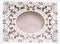 White paper hollow lace oval frame, done in the ornate and luxurious style on a pink background, place for text, room for copy