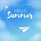 White paper plane in a blue sky with clouds. Hello Summer text in a heart shape. Summer season and vacation theme