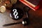 White paragraph symbol and judge gavel with scales and books at lawyer office. Top view