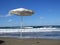 White Parasol Umbrella on Sandy Beach During Exotic Vacation