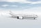 White passenger airliner at the airport apron isolated on bright background with sky