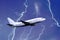 White passenger airplane takes off during a thunderstorm night lightning strike of rain, bad weather.