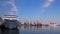 A white passenger ship docked in the port