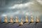 White pawn is ahead of the others. Cloudy sky. Leadership concept. Success. Abstraction. Business B