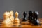 White pawn, in front of black, on a chessboard. Selective focus. Correct move. Strategy. Sport. Business