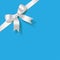 White Pearl ribbon on a light blue background.