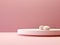 A white pedestal in a pink shelf used to showcase products. Generative AI