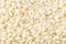 White peeled sesame seeds close up, background, texture