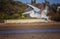 White Pelican,Pelecanus rufescens is flying in the sea lagoon in Africa, Senegal. It is a wildlife photo of bird in wild nature