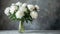 White peonies in a glass vase on a textured background