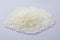 White PET granules, polymer resin, plastic granulate for injection molding process.