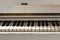 White pianoforte, front view instrument, musical instrument. lea