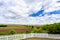 White Picket Fence, Farmland, and Clouds