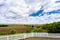 White Picket Fence, Farmland, and Clouds