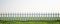 White picket fence on grass