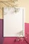 White picture frame with empty template, gypsophila flowers, cream, purple and red pastel colored background