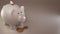 White piggy bank with cryptocurrencies, golden physical coins, Ripple, Zcoin, Bitcoin and Etherium. Mining cryptocurrency concept