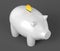 White piggy bank with gold coin on dark background