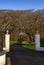 White Pillars and Driveway leading into Forrest