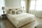 White pillows setting on English country style bedding