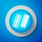 White Pills or capsules in blister package icon isolated on blue background. Tablets in package. Medications Accessory