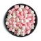 White and pink Fluffy marshmallows in dark bowl isolated on white background. Top view