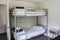 White plain bunk bed in dormitory