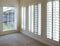 White plantation style wood Shutters